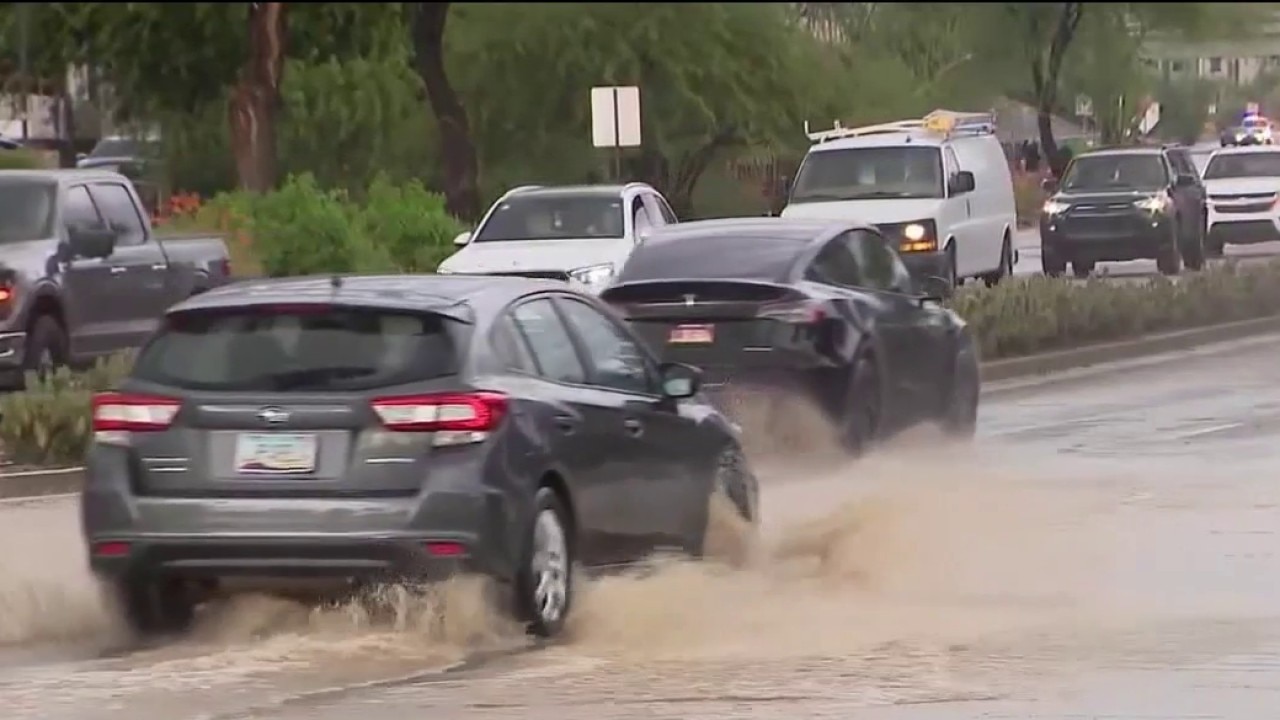 Officials warn of the dangers of driving into flooded roads