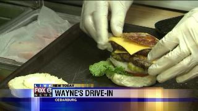 Laura makes burgers for breakfast at Wayne's Drive-In