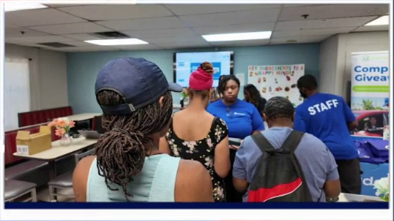 East Point, Palmetto residents receive free laptops