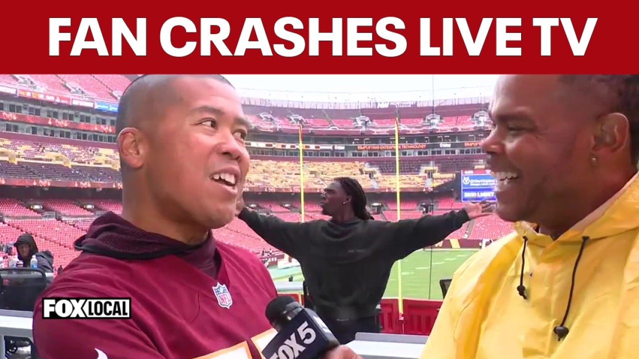 Dancing Commanders fan crashes reporter's live shot