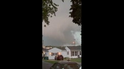 Wall cloud appears in sky on tornado-warned supercell in Illinois