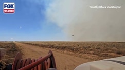 Watch: Air tanker drops water on Sharpe Fire outside Campo, Colorado