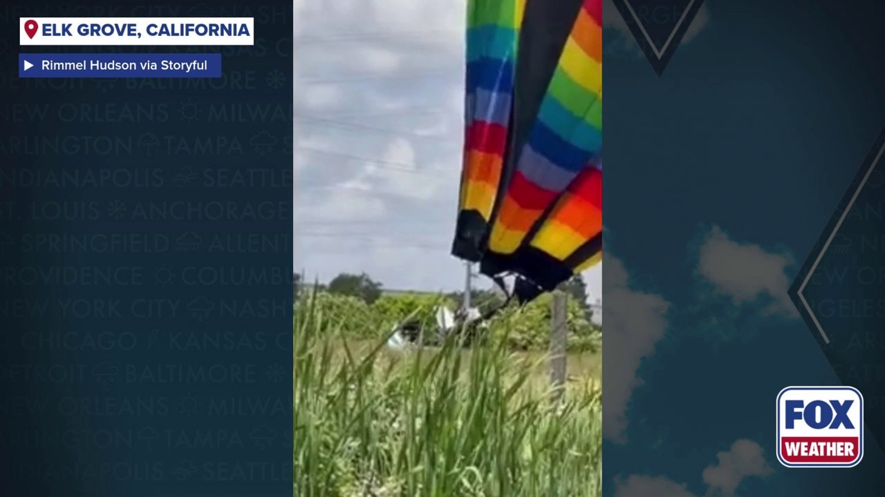 See it: Wind-tossed hot air balloon slams into California casino and power line before safely landing 
