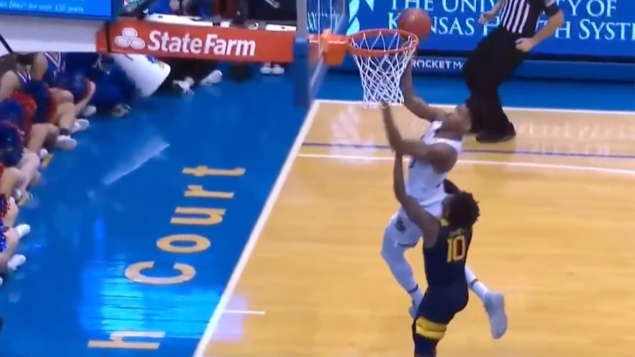 Ochai Agbaji continues his big day with an and-1 for Kansas