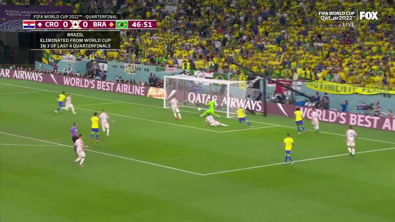 Croatia's Dominik Livakovic makes an incredible save to keep the