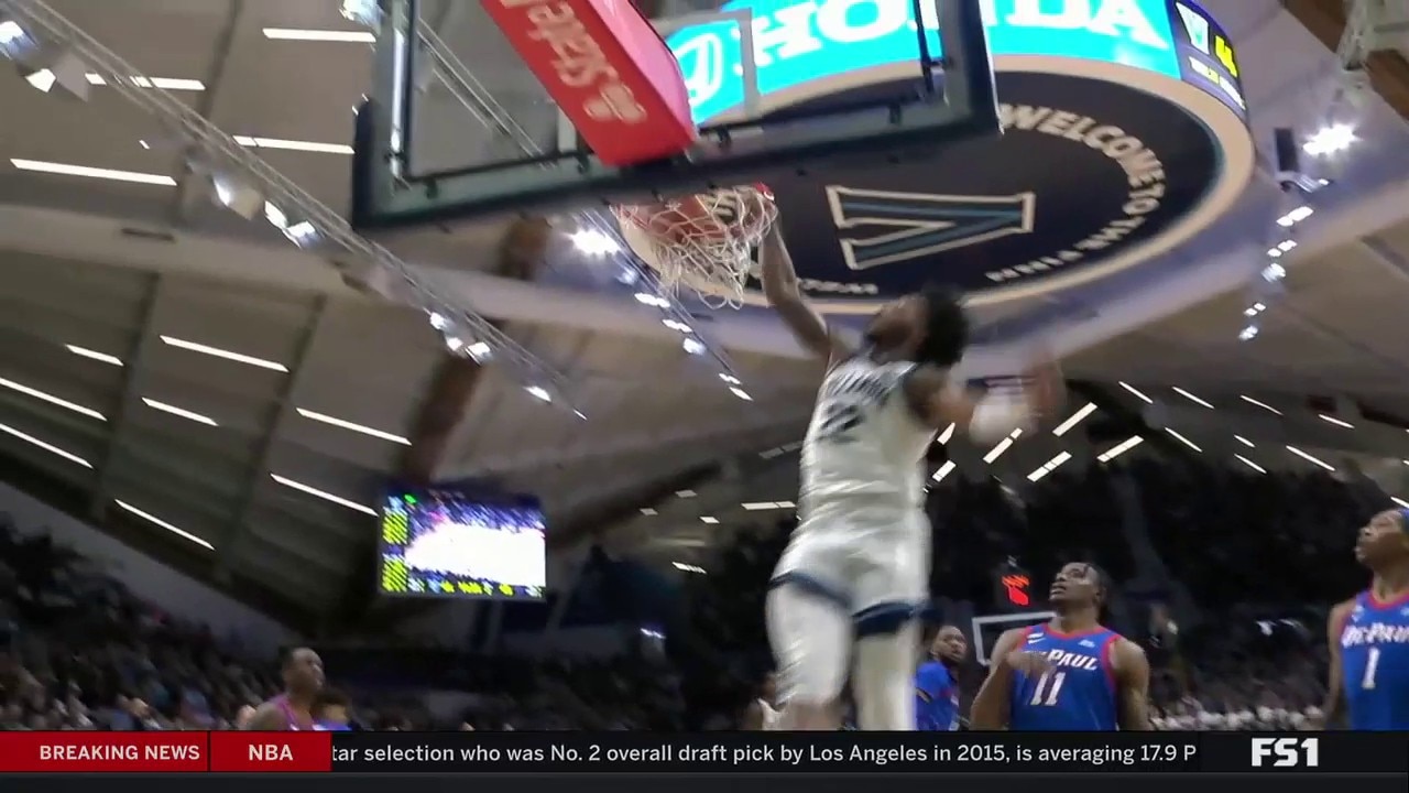 Villanova's Cam Whitmore throws down a WILD jam to take a second-half lead against DePaul