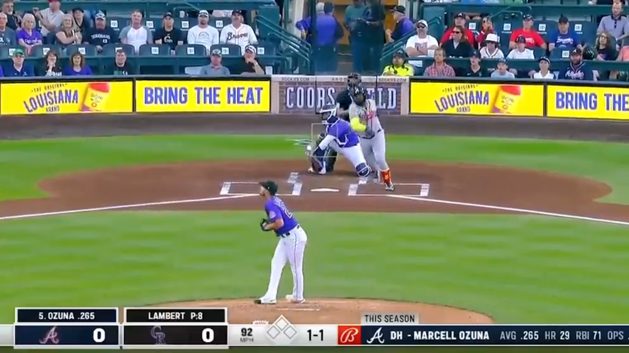 Marcell Ozuna CRUSHES a solo home run to give the Braves an early lead over the Rockies